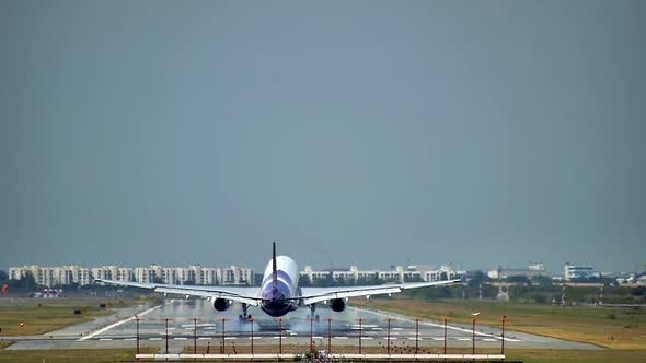 Commercial aeroplane or airliner on a final approaching landing at an International Airport on a cle