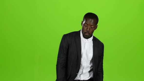 Businessman Moves Funny, Tries To Dance, Has Fun. Green Screen. Slow Motion