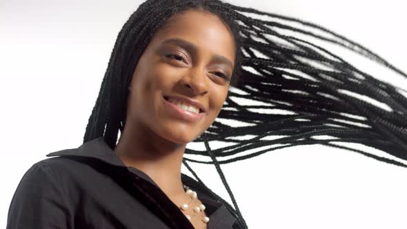 Mixed Race Woman with Hair Braids in Studio on White Closeup Portrait