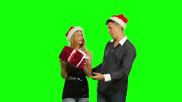 Christmas Couple, Gift Box Present. Green Screen. New Year. Slow Motion