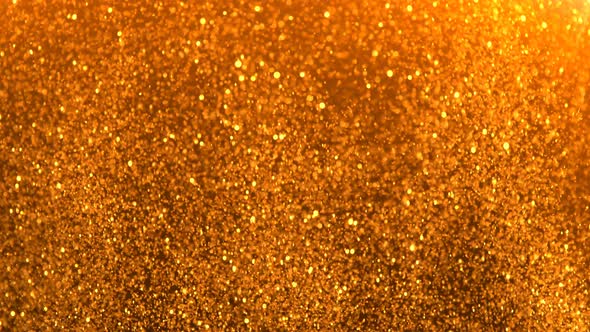 Gold Glitter Background in Super Slow Motion alt