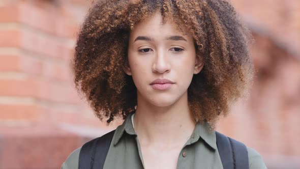 Closeup Headshot Annoyed Sad African American Young Woman with Distrustful Face Hurt Upset Offended