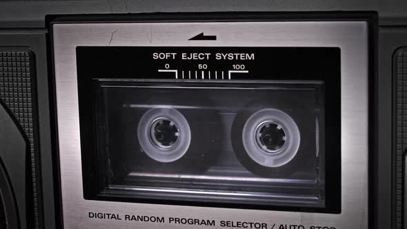 Audiocassette Rotates in Retro Tape Recorder