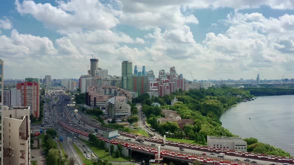 Aerial Drone Zoom in of Moscow Suburban Panorama Under Cloudy Sky