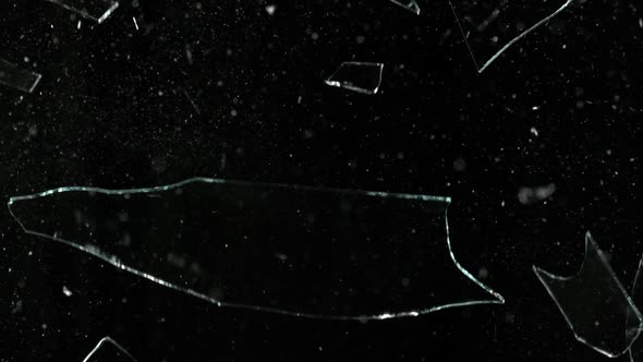 Super Slow Motion Shot of Real Glass Break at 1000 Fps Isolated on Black Background