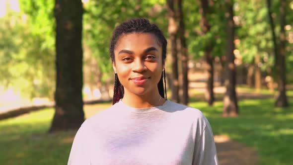 Laughing African American Female Walking To the Camera