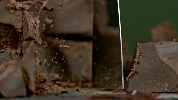 Super Slow Motion Shot of Cutting Raw Chocolate Chunk at 1000 Fps