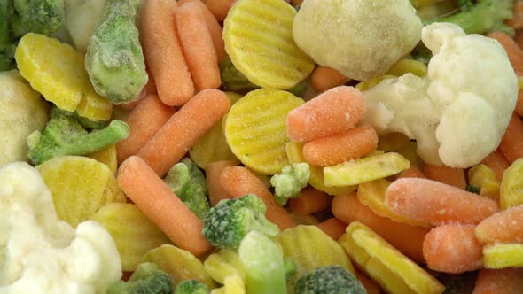 Fresh Frozen Vegetables Rotating for Background Healthy Food or Diet Food for Vegetarians and Vegans