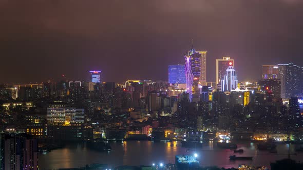 Macau Peninsula Aerial Cityscape Night Timelapse Pan Up