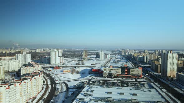 City quarters. Multi-story houses. Winter cityscape.