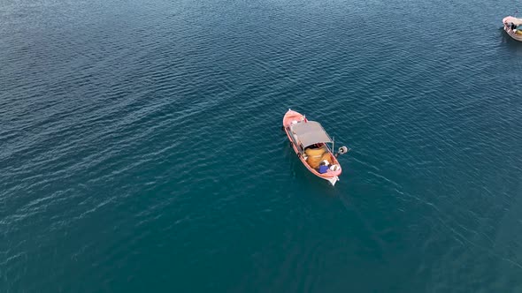 Fishing boat goeas to sea aerial view Turkey Alanya 4 K