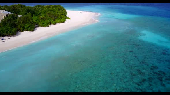 Aerial above seascape of luxury bay beach vacation by blue sea with white sandy background of a dayo