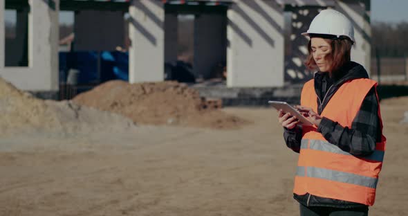 Engineer Using Digital Tablet at Construction Site