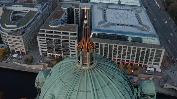 Tilt Down Footage of Berlin Cathedral Dome Roof with Religious Cross