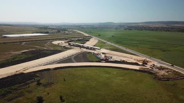 Aerial View of Construction Of Highways . Road Construction Machinery