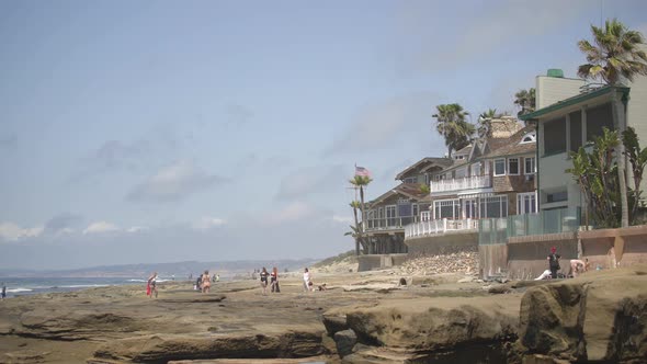 People on a rocky shore alt