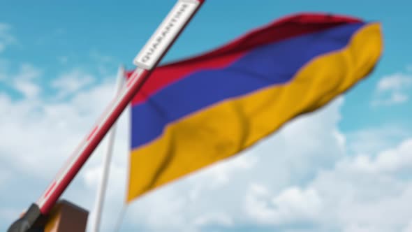 Barrier with QUARANTINE Sign Being Closed at Flag of Armenia