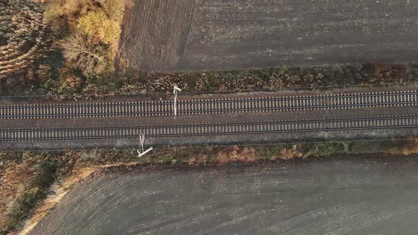 Aerial View of Railway Track Among Agricultural Fields
