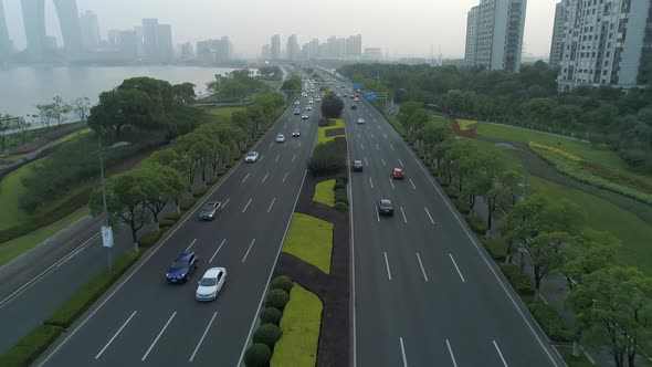 Aerial View of Cars Running on the City Road at Sunset China