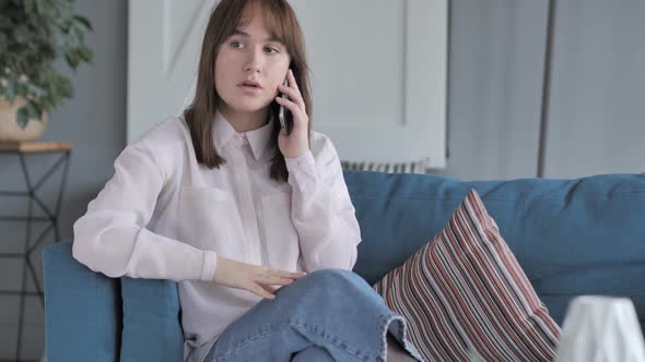 Young Girl Talking on Phone