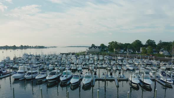 Sunrise Aerial Drone Flyover of Quiet Marina (Norwalk, Connecticut)