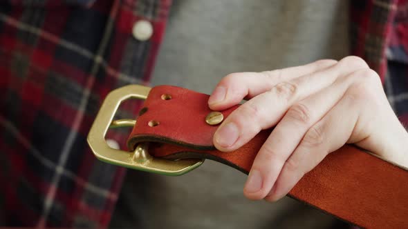 Man Tailor Repairing Belt Artificial Leather Closeup