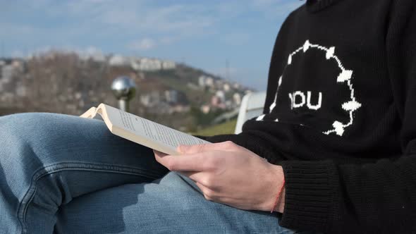 Reading Book At Bench