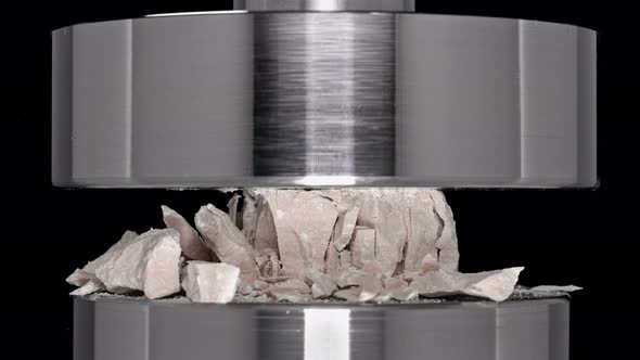 Construction Crushed Stone Is Tested and Tested on a Hydraulic Press, Close-up