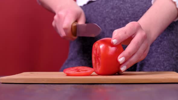 Women's Hands Cut Vegetables Tomato