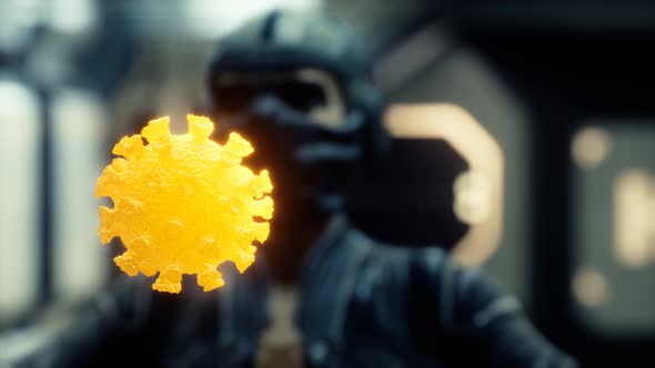 Woman in Protective Medical Mask on Her Face Looking at COVID-19 Coronavirus alt
