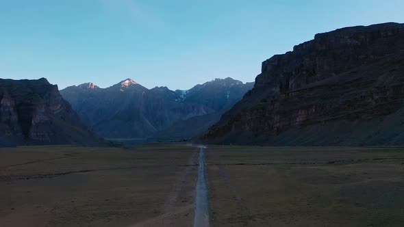 Aerial Forward Moving Shot of a Himalayan Road in Spiti Valley , Himachal Pradesh , Vertigo Effect