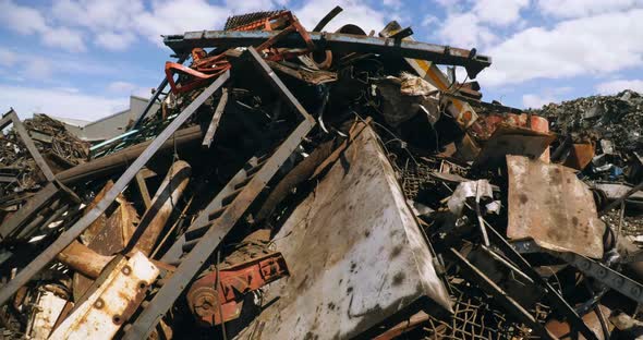 Rusty metal pieces in scrapyard 4k