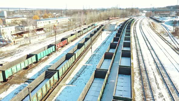 Railway station of freight trains. Cargo train platform with freight train container at depot