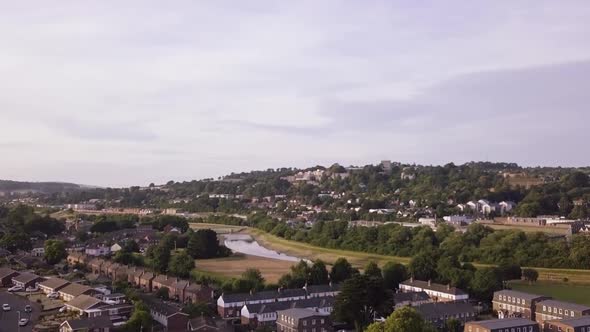 Beautiful aerial view of a local residential area in Exeter with a river flowing through.
