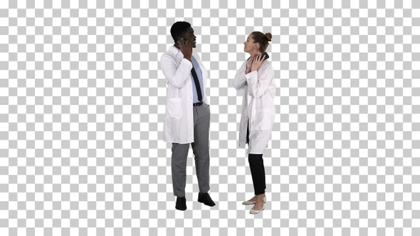 Female and male doctor using mobile phones making calls telling