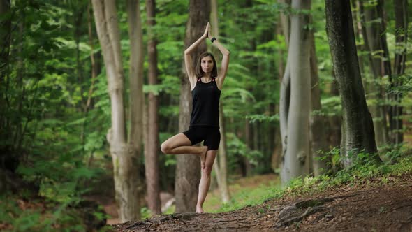 Womam Doing Yoga at Forest