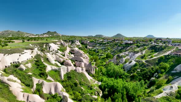 Awesome aerial view of rock formations called the Fairy Chimneys in Cappadocia 4 K