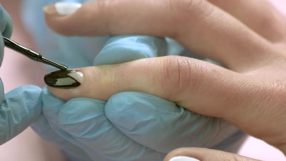 Close Up Nail Design with Black Polish.