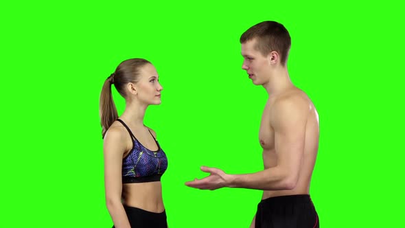 Couple Talking at the Gym. Slow Motion. Green Screen