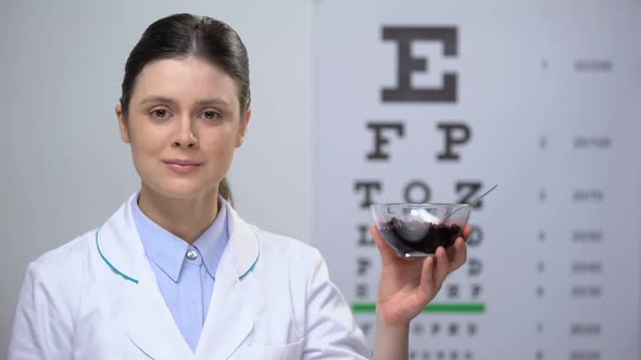Female Ophthalmologist Suggesting Blueberries, Natural Vitamins for Good Sight