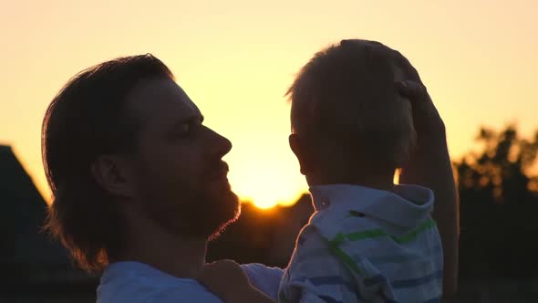 Father and Son at Sunset
