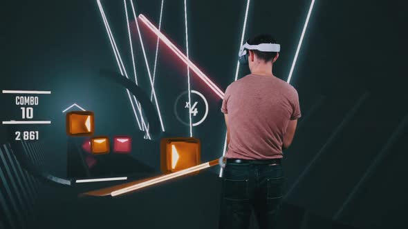 Person in Virtual Reality Headset Plays an Action VR Game in Augmented Reality