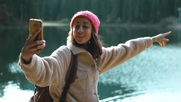 20s Hiker Photographer Hipster Woman in Woods Shooting Selfie Lake View