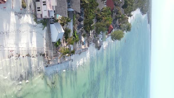 Vertical Video of the Ocean Near the Coast of Zanzibar Tanzania Aerial View