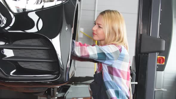 Woman Is Changing Replacing Brakes