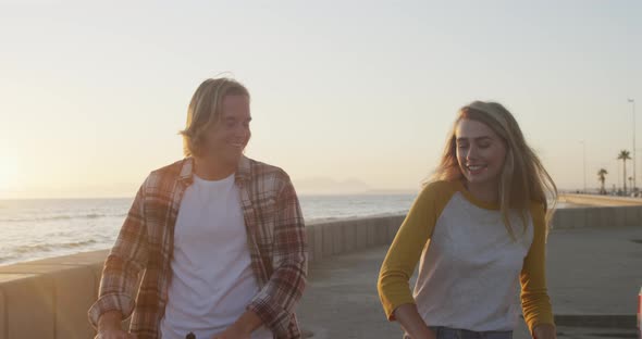 Caucasian couple enjoying their time seaside