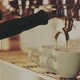 Barista Making a Cup of Strong Coffee in a Coffee Machine - VideoHive Item for Sale