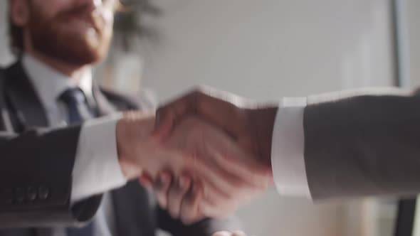 Close Up of Handshake of Multiethnic Business Partners