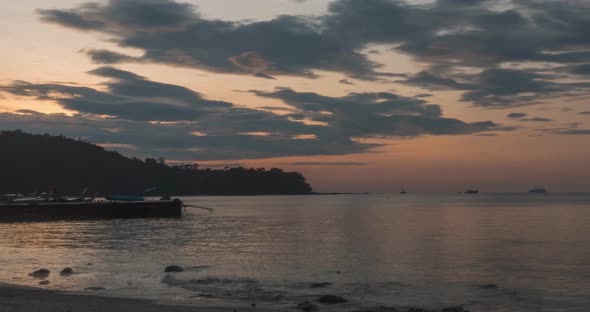 Timelapse Sunrise From Dark to Bright Day Sun Over Sea Waves are Washing