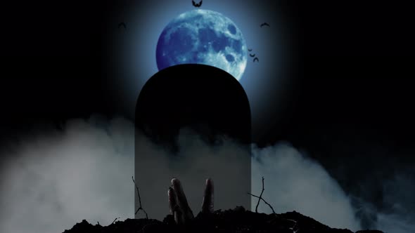 Human Hand Climbs Out of the Grave and Behind It Stands a Monument and the Blue Moon. Black Smoky